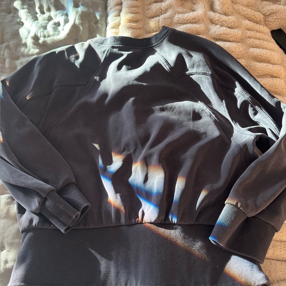 Lululemon Black batwing top sz 12. Fits smaller